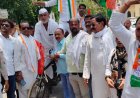 महंगाई और पेपर लीक के विरोध में कांग्रेस का प्रदर्शन, रिक्शे पर बाइक रखकर जताया विरोध